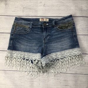 LEI Ashley Low Rise Blue Jean Denim Shorts Camo & Fringe Details